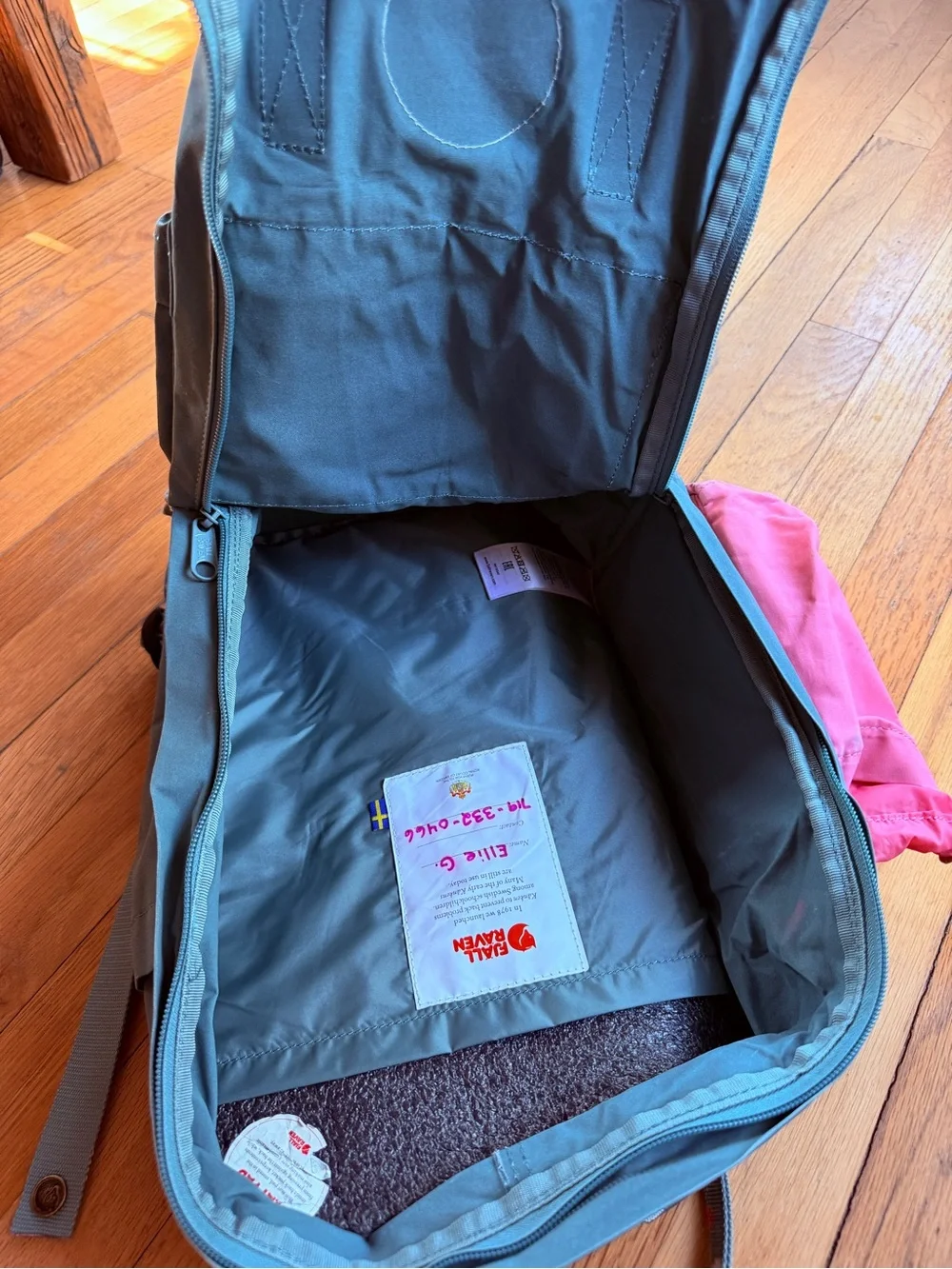 Fjallraven gray and pink polka dot backpack